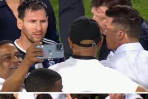 都想合张影！梅西赛后被对手代表团围住，在护送下才得以离开球场